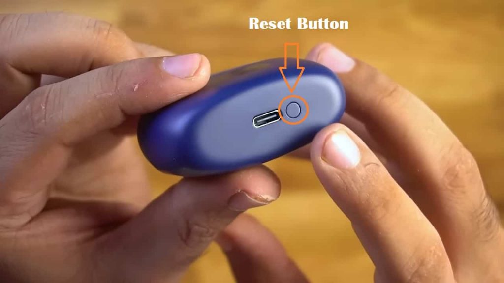 boAT Airdopes 121 Pro reset button at the bottom of the charging case